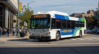 New flyer Xcelsior City Bus Turning on The Road