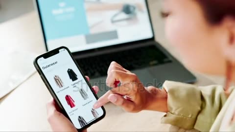 Phone screen, hands and online shopping for clothes choice.