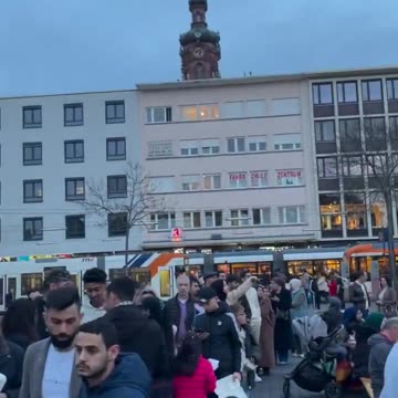 Ramadan in Mannheim, Germany, outside the parish church of St. Sebastian.