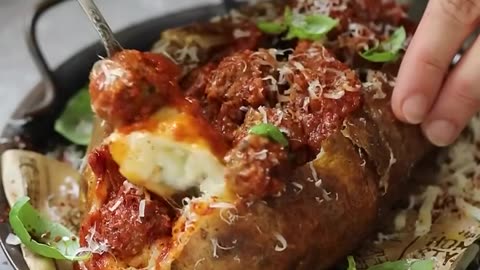 Lets make a baked potato mixed with butter and cheese and put a meatballs for the top.