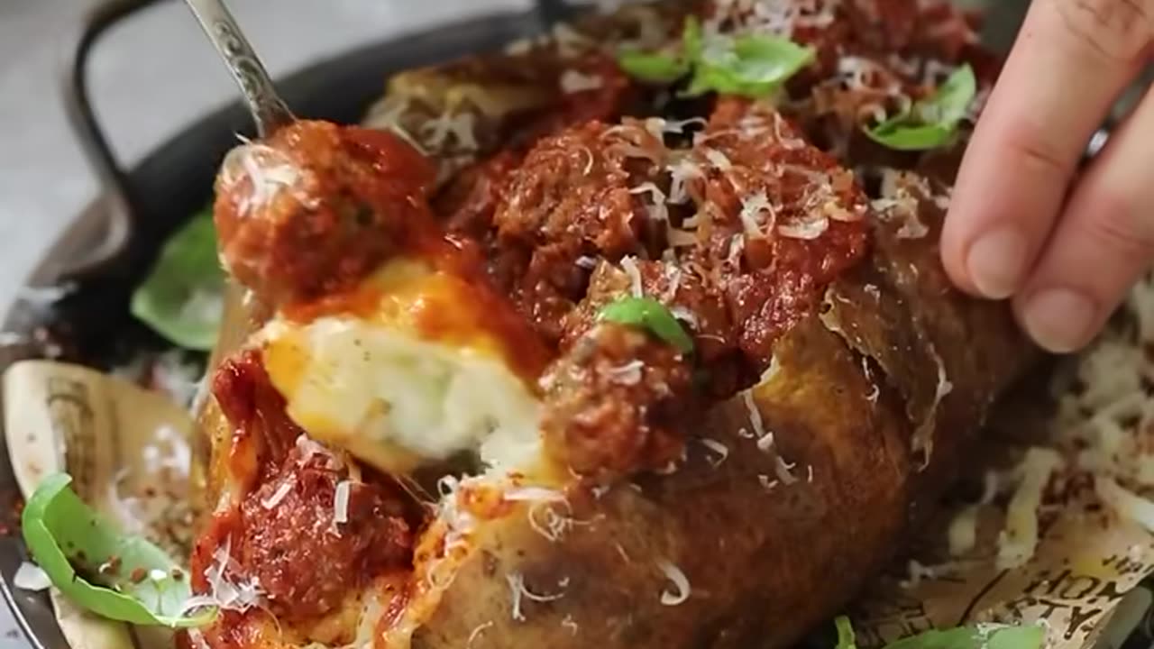Lets make a baked potato mixed with butter and cheese and put a meatballs for the top.