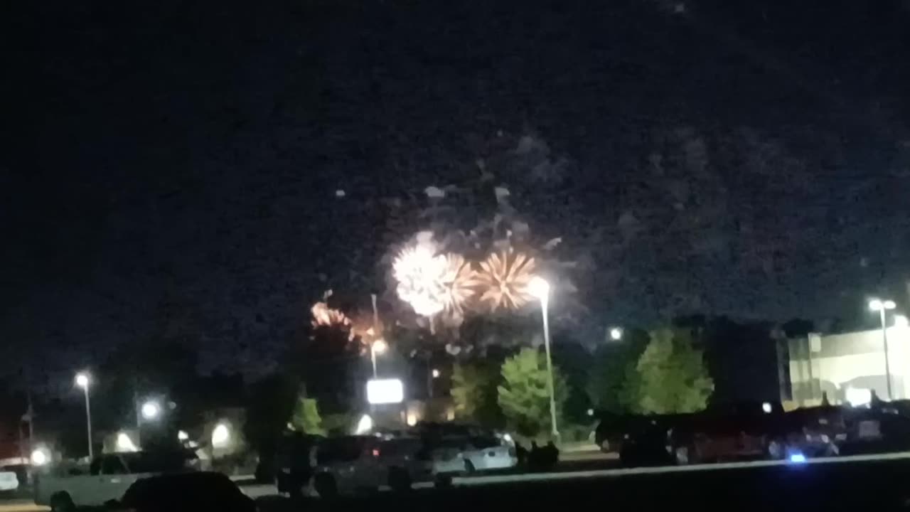 Fireworks and me and my dad wearing hats!!