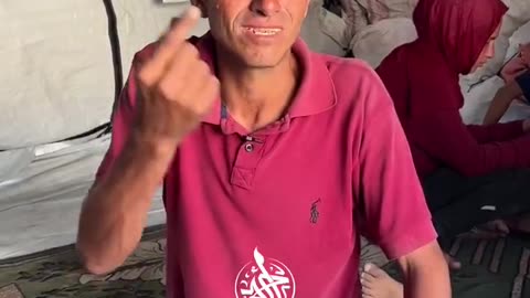 Palestinian describes the famine and the harsh living conditions of the displaced families in Gaza City.