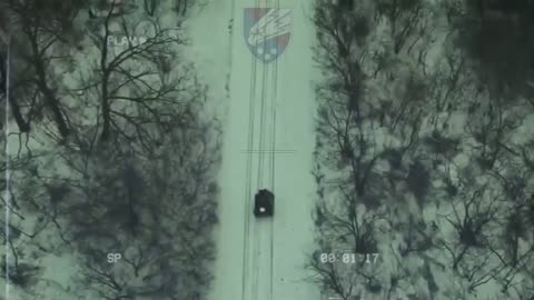 Operators of the 25th Airborne Brigade on ground drone, possibly Ratel-M, delivered supplies