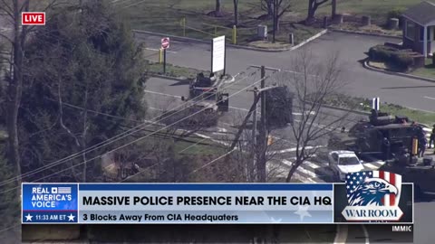 SWAT and police are responding to reports of a man with a gun spotted near CIA