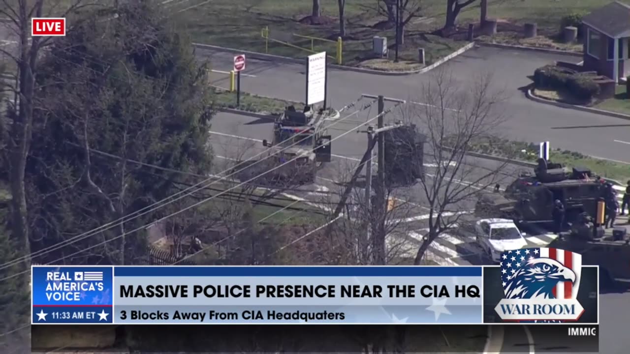 SWAT and police are responding to reports of a man with a gun spotted near CIA