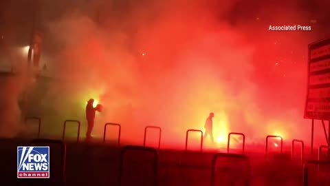 Riots are breaking out in Milan as Antifa groups attack riot police.