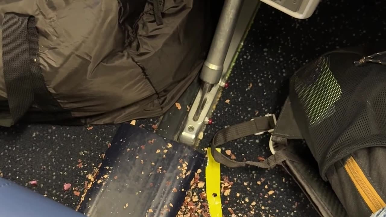 Passenger Discards Nut Shells Over Airplane Floor