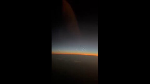 New video from a plane's cockpit shows Iran's ballistic missiles heading towards Israel