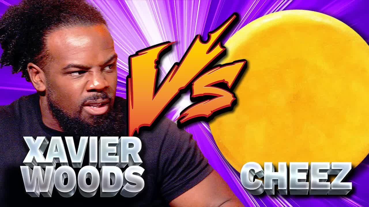 Xavier Woods Goes Head-to-Head Against A Wheel of Cheese in Multiversus