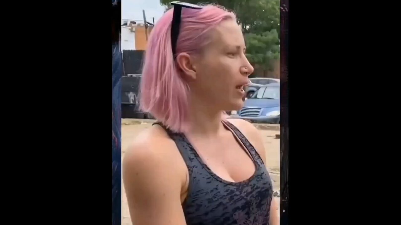 This pink-haired wokie doesn't think too highly of you if you fly an American flag.