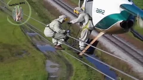 High Voltage Helicopter Lineman