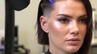 A Robot barber giving a perfect haircut