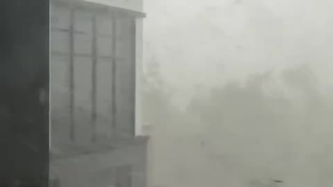 WATCH: Tornado partially tears down building near St. Louis, Missouri.