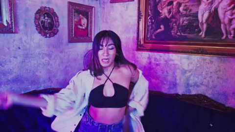 Young woman dances with great dynamism.