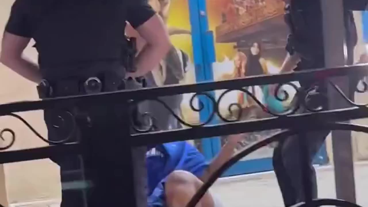 Officers restrain Myrtle Beach shooter