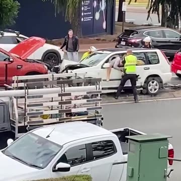 Australian Cop Punches WHITE Driver In The Face