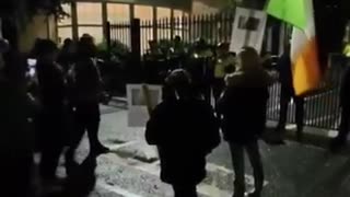 Crowds gather outside Citywest Hotel in Dublin following the alleged rape of a 10-year-old girl