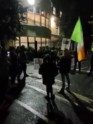 Crowds gather outside Citywest Hotel in Dublin following the alleged rape of a 10-year-old girl