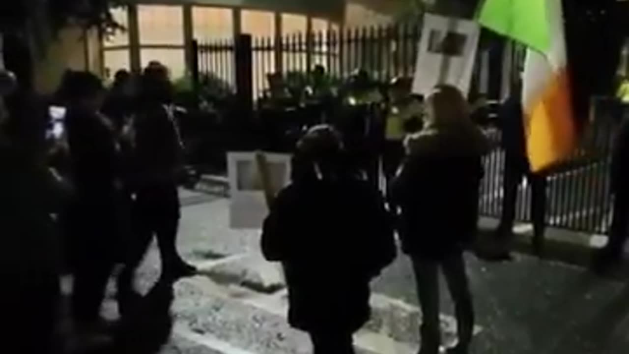 Crowds gather outside Citywest Hotel in Dublin following the alleged rape of a 10-year-old girl