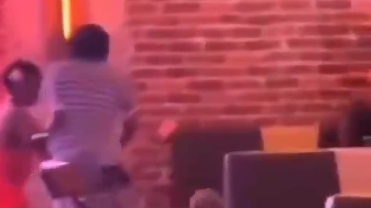 negress hits another one with a bowling ball lol