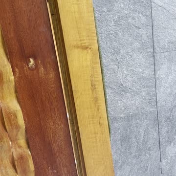 Green Thai Snake Climbs Down Slick Wall- the Hides in Wooden Door Frame