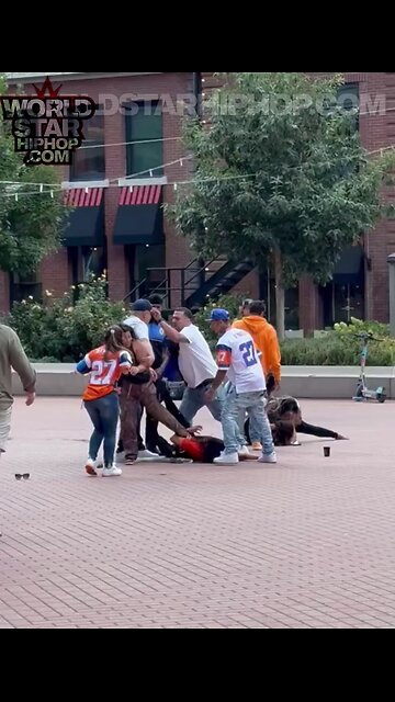 👀💪 A security guard floors a thug Denver Broncos supporter near a local brewery