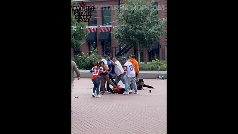 👀💪 A security guard floors a thug Denver Broncos supporter near a local brewery