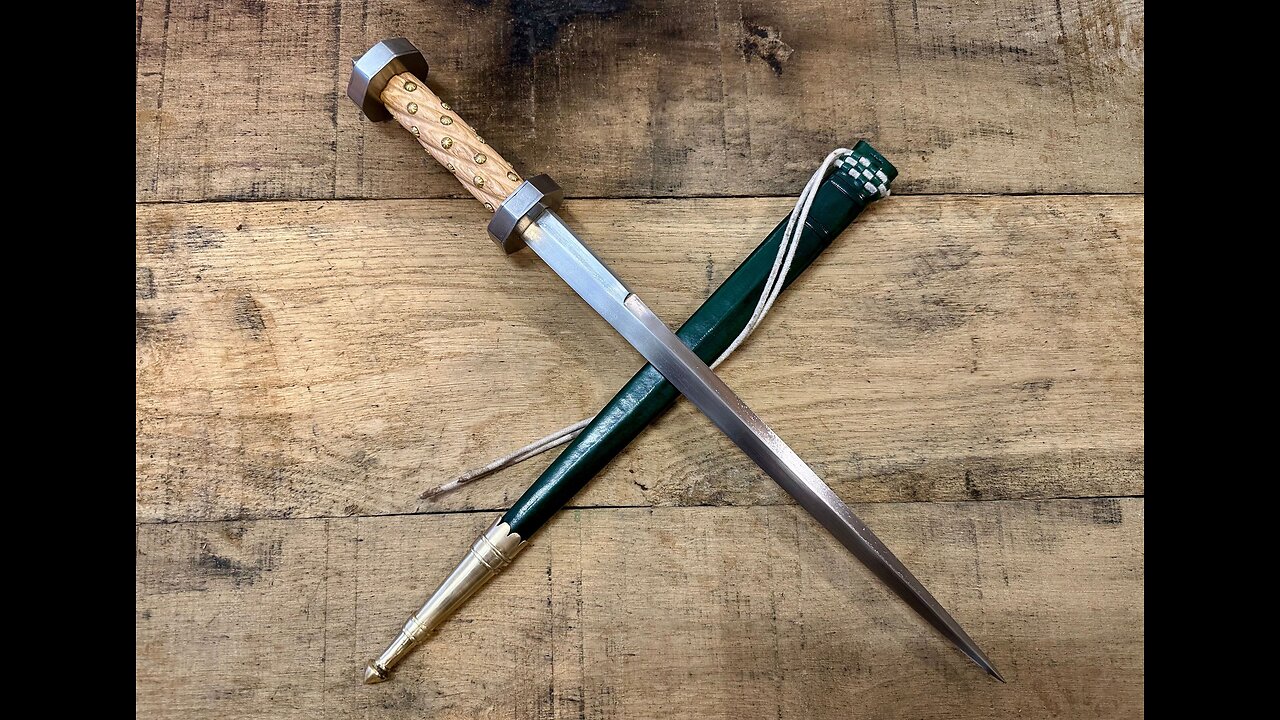 Apple Drop Cuts with a Medieval Rondel Dagger by Tod Cutler