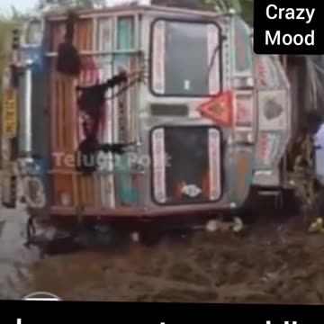 Lorry overturns while checking road