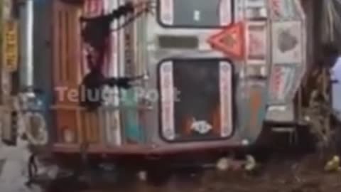 Lorry overturns while checking road
