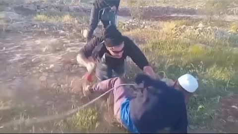 A channel 4 report shows armed Israeli settlers shooting an unarmed elderly Palestinian farmer