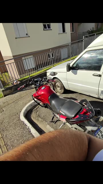 Boy Rides Bicycle Into Motorcycle's Tail