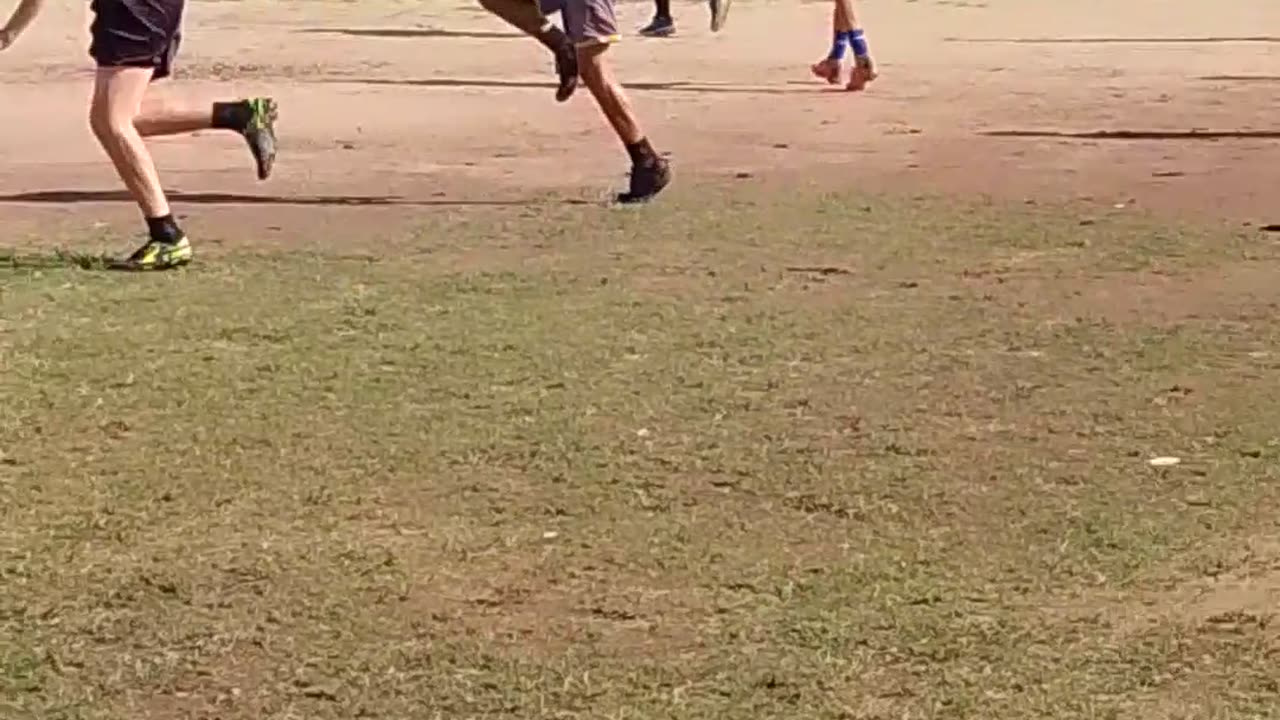 Young Football Players Practice High Knees