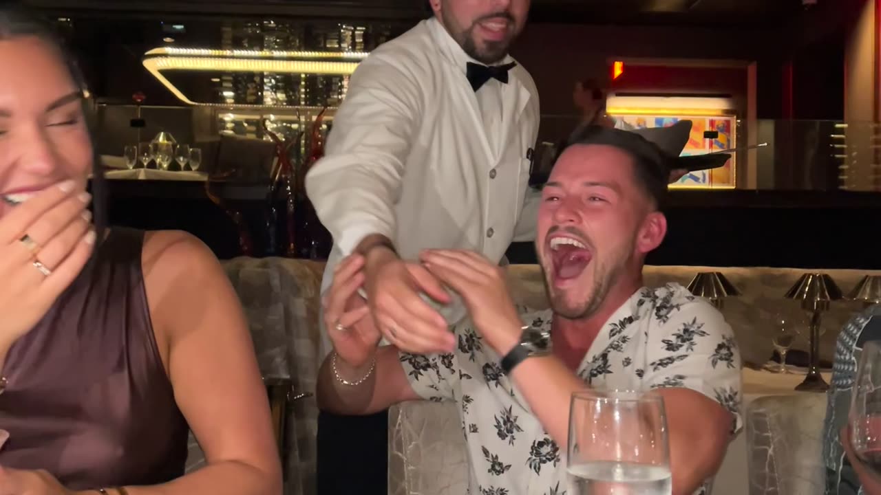 Man Accidentally Claps Birthday Dessert Out Of Server's Hands