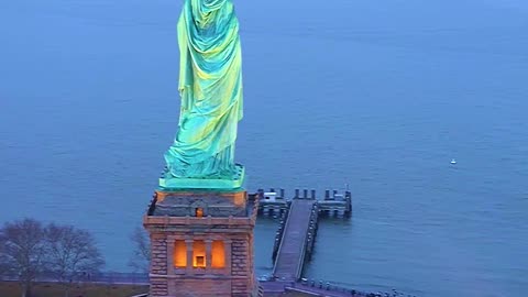 The Statue of Liberty, rising proudly in New York Harbor..
