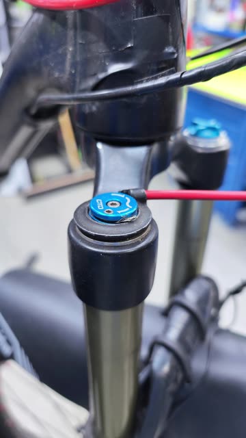 Very convenient lever for switching bicycle suspension lockout.