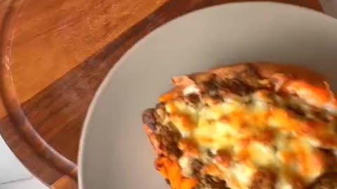 We ll make a baked sweet potato fill with beef on top and mozzarella