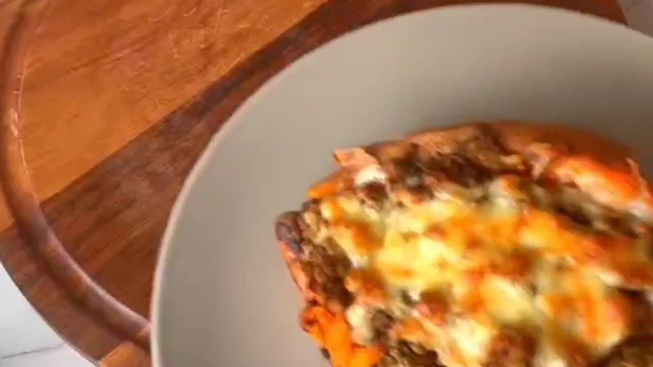 We ll make a baked sweet potato fill with beef on top and mozzarella