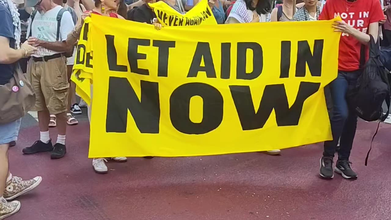 "Mass march for humanity" in Times Square.