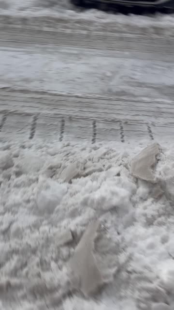 Snowplow Buries New Yorker's Car