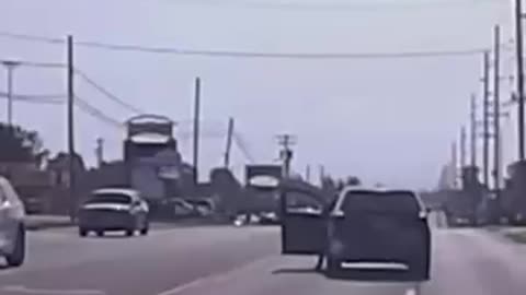 A heroic cop jumped into action after an elderly man had a heart attack behind the wheel
