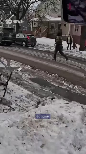 An ICE agent has become the subject of a viral video after comically slipping on ice