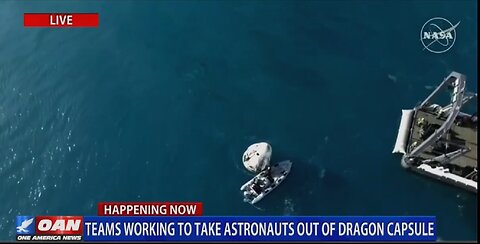 TEAMS WORKING TO TAKE ASTRONAUTS OUT OF DRAGON CAPSULE