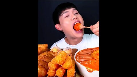 Rose cream udon noodles, rice cake ribs, sausages, fried shrimp, fried dumplings, mini hot dogs