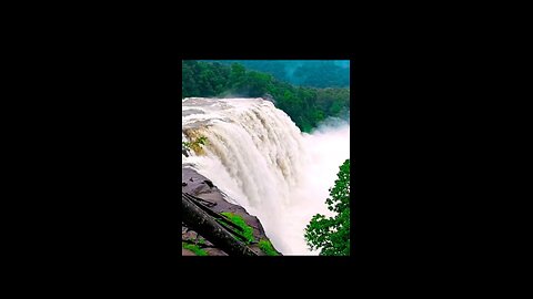 athirappally waterfalls kerala in a rainy day