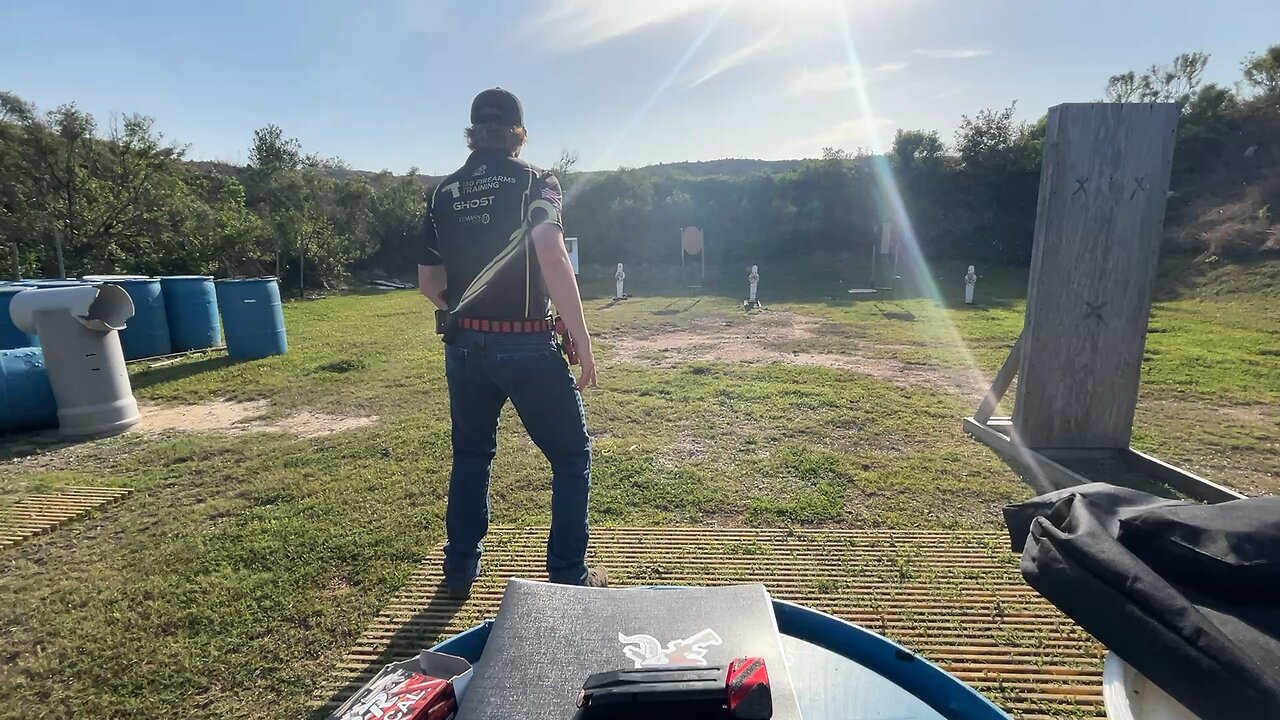 Practicing shooting targets while moving.