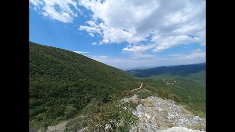 Hiking in two weather zones, sunny, windy and rainy