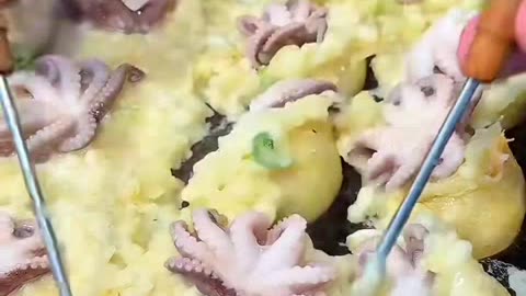 Have a takoyaki topping a baby octopus