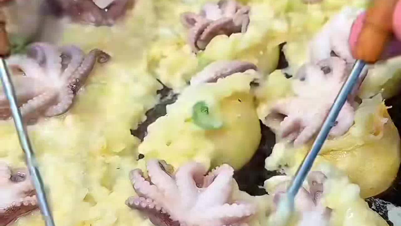 Have a takoyaki topping a baby octopus